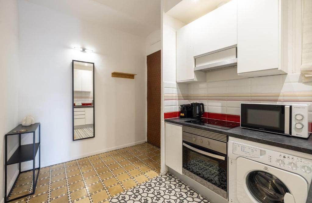 Kuchyň nebo kuchyňský kout v ubytování Stay U-nique Apartments Radas