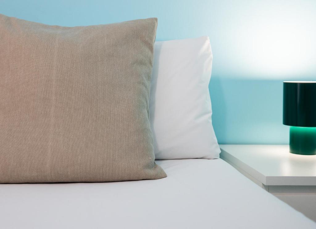 Postel nebo postele na pokoji v ubytování Stay U-nique Apartments Radas
