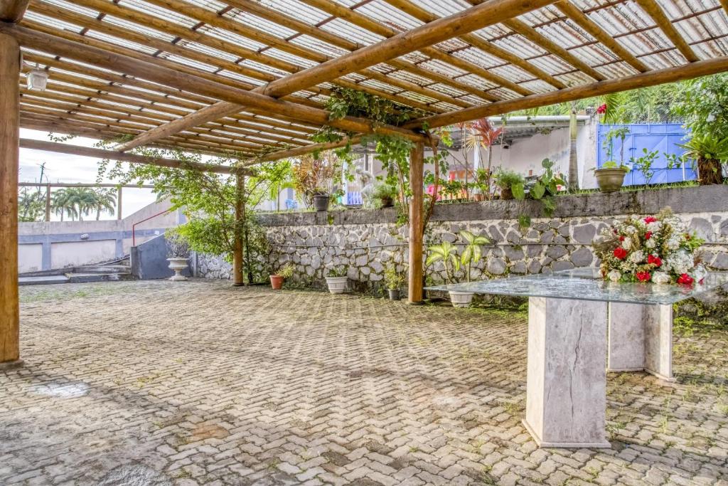Zahrada ubytování OYO Praia Hotel Recanto do Tomé - Salvador