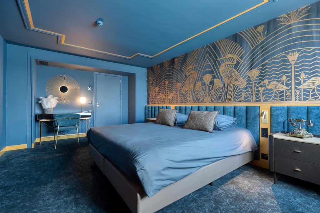 Postel nebo postele na pokoji v ubytování Van der Valk Hotel Liège Congres