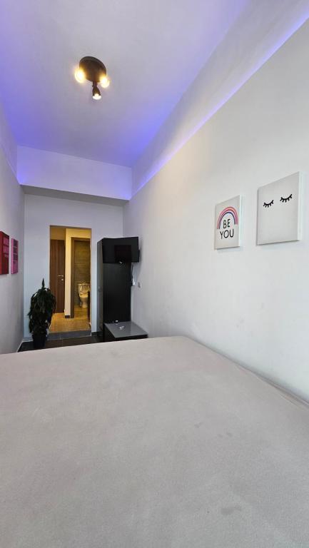 TV a/nebo společenská místnost v ubytování Aime's House