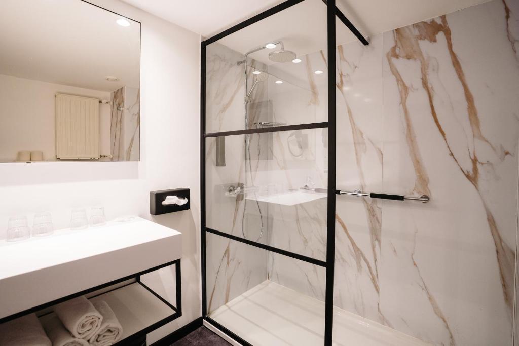 Koupelna v ubytování Ostend Hotel