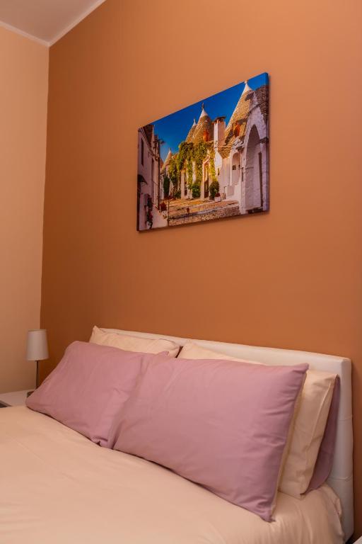 Postel nebo postele na pokoji v ubytování Apulia Concept B&B