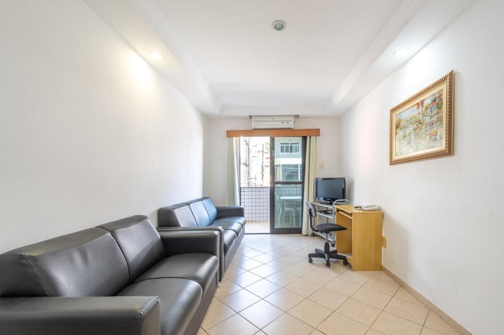 TV a/nebo společenská místnost v ubytování OYO Residencial Itacuruçá Apart Hotel, Mangaratiba