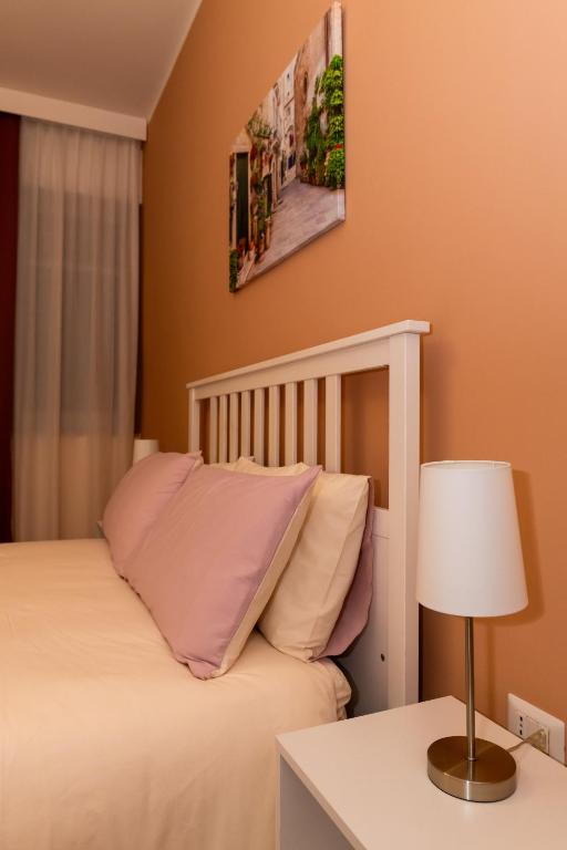 Postel nebo postele na pokoji v ubytování Apulia Concept B&B