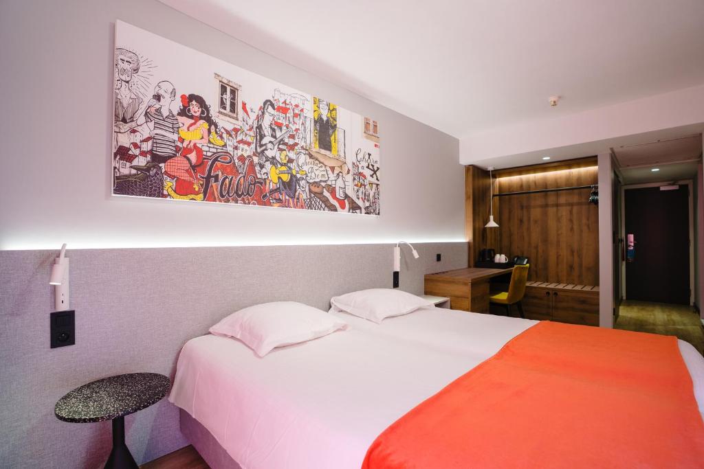 Postel nebo postele na pokoji v ubytování Ostend Hotel