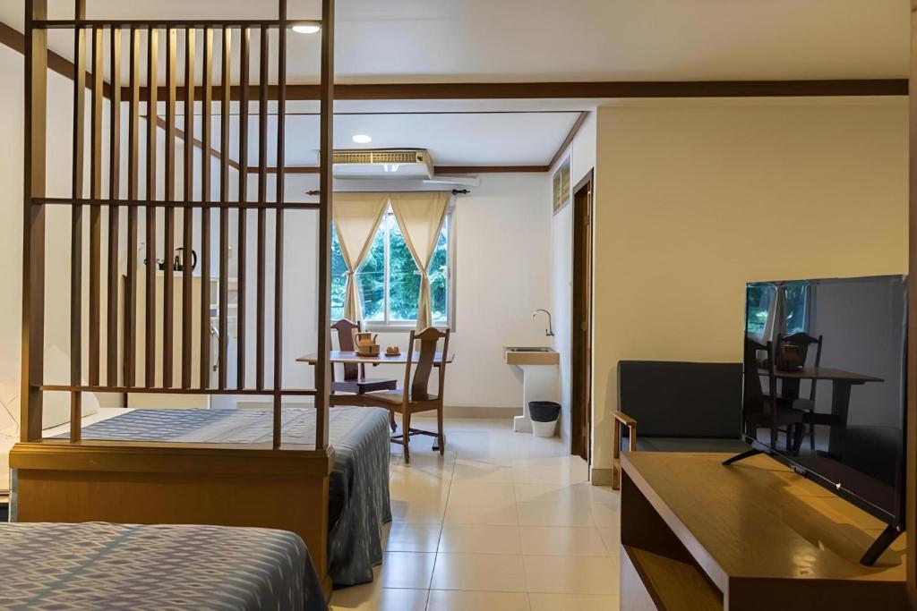 TV a/nebo společenská místnost v ubytování Collection O Howard Square Boutique Hotel