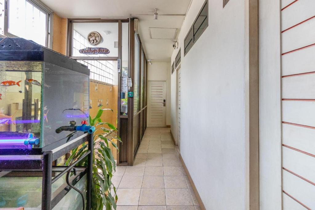 Fotografie z fotogalerie ubytování OYO 583 Sweethome Guest House v destinaci Bangkok Noi