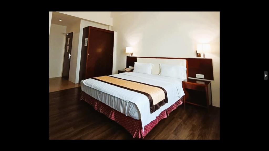 Postel nebo postele na pokoji v ubytování OYO 91037 Atari Inn