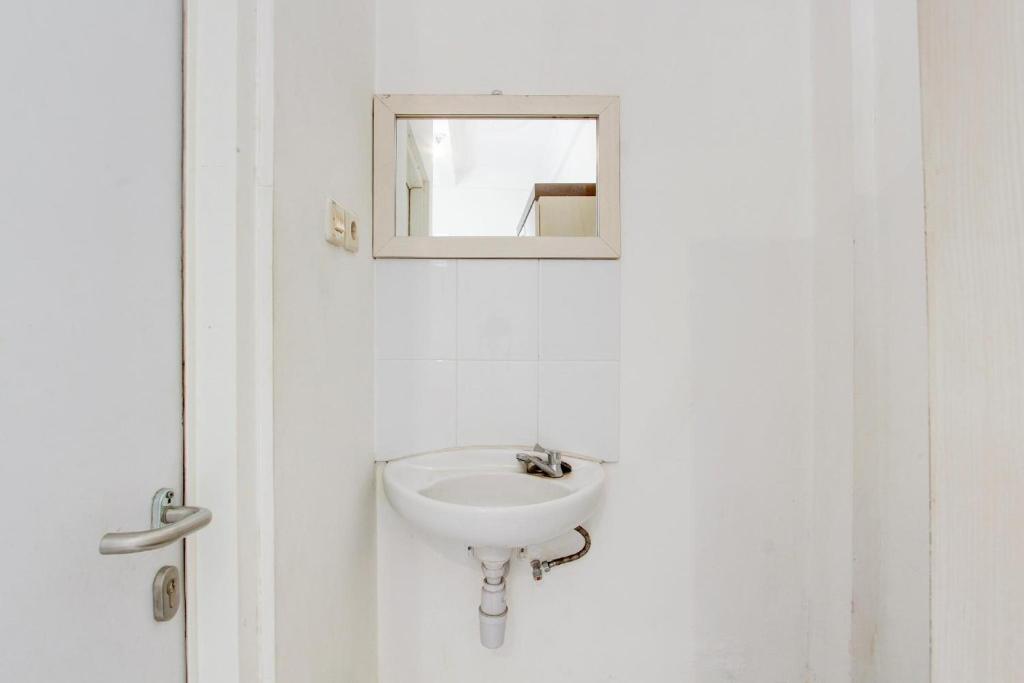 Koupelna v ubytování Hotel O Wisma Arya 2