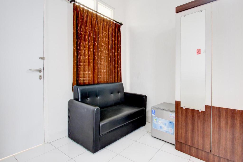 Posezení v ubytování Hotel O Wisma Arya 2