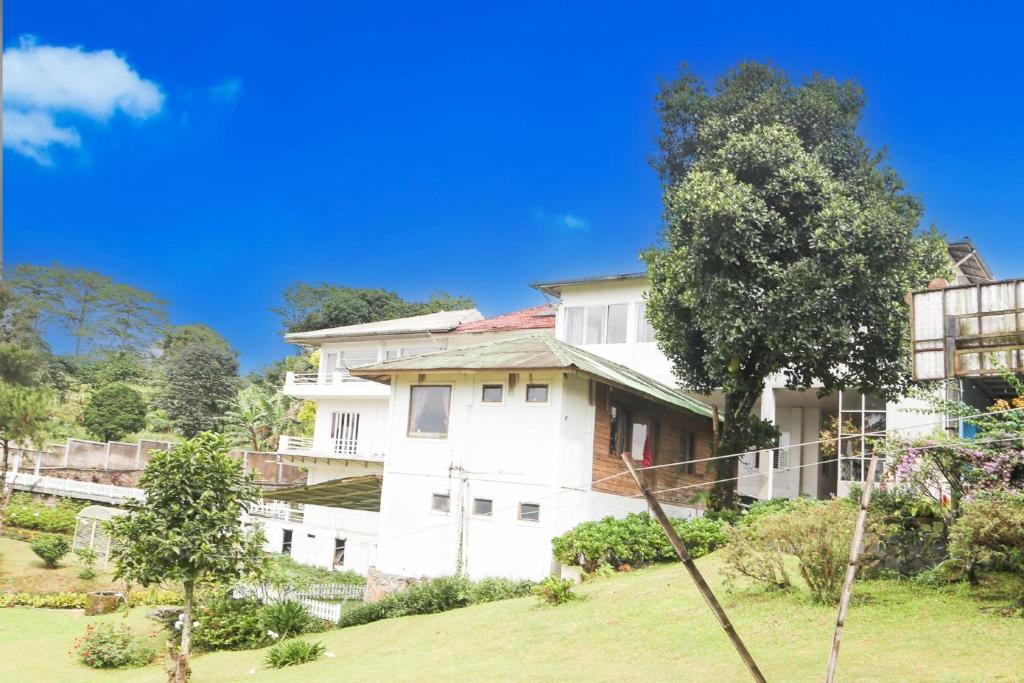 Vườn quanh Collection O Bogor Puncak Near Gunung Mas Formerly Villa Bunga Bunga