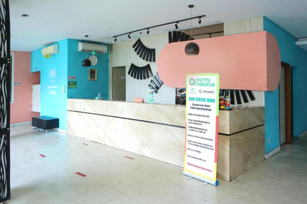 Certifikát, hodnocení, plakát nebo jiný dokument vystavený v ubytování Super OYO Townhouse OAK Hotel Fiducia Pondok Gede