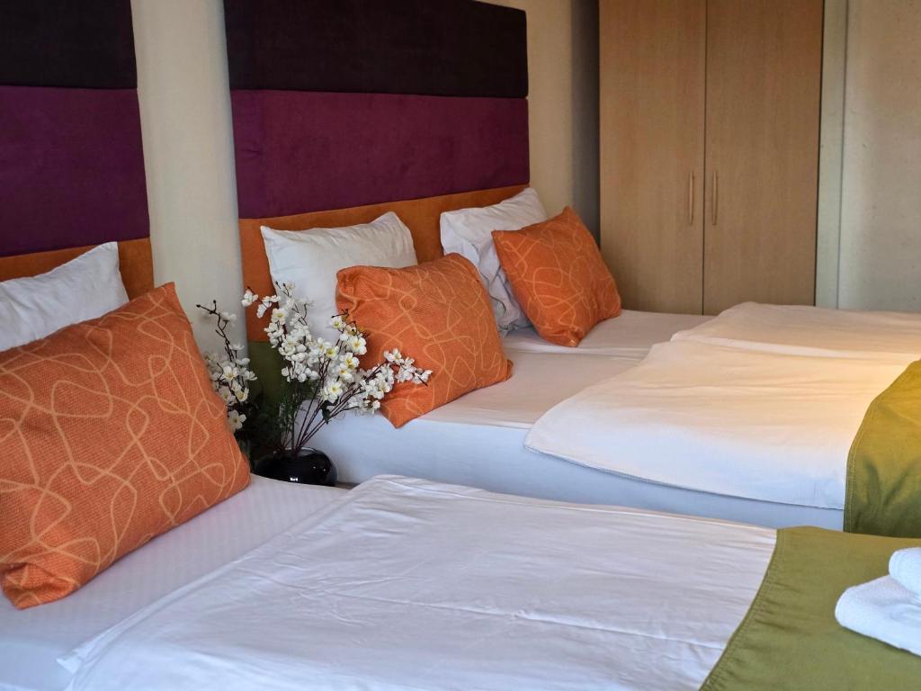 Voodi või voodid majutusasutuse Hotel Hecco toas