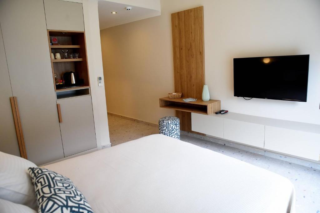 Postel nebo postele na pokoji v ubytování Mozaik Hotel
