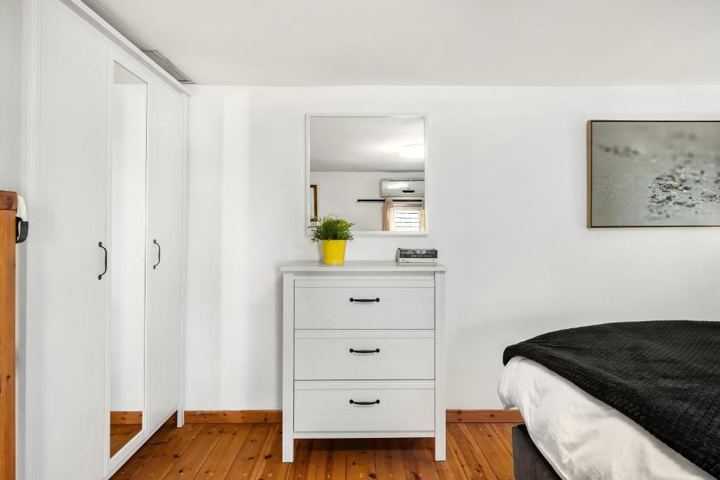 Postel nebo postele na pokoji v ubytování One Apartments TLV
