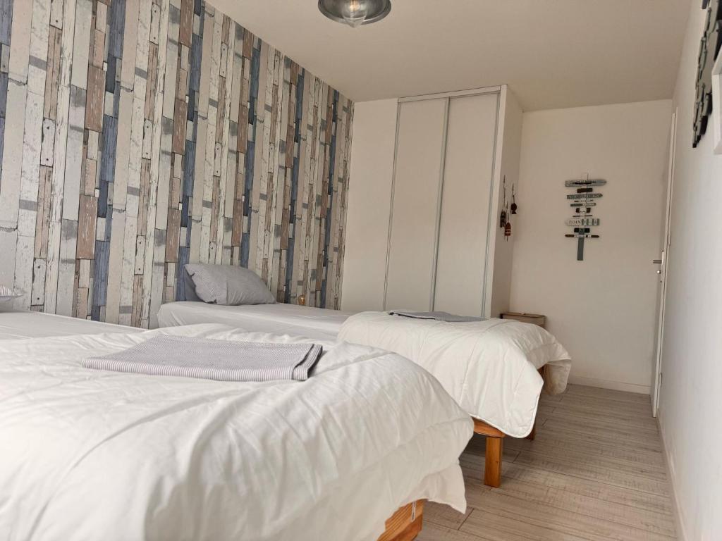 Posteľ alebo postele v izbe v ubytovaní Duplex Normandie, tout confort Saint Valery en Caux