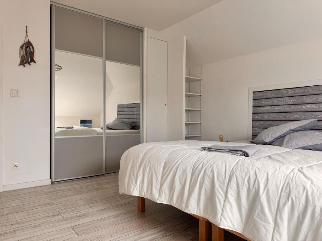 Posteľ alebo postele v izbe v ubytovaní Duplex Normandie, tout confort Saint Valery en Caux