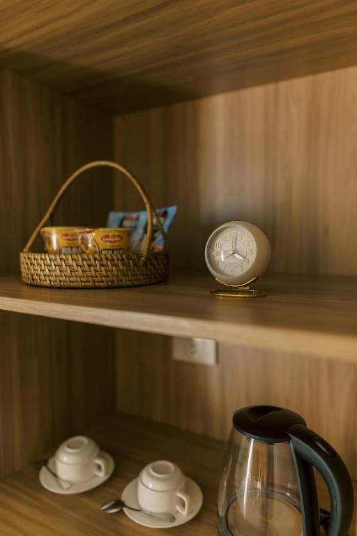 Příslušenství pro přípravu čaje a kávy v ubytování Palms La Union Beachfront Suites