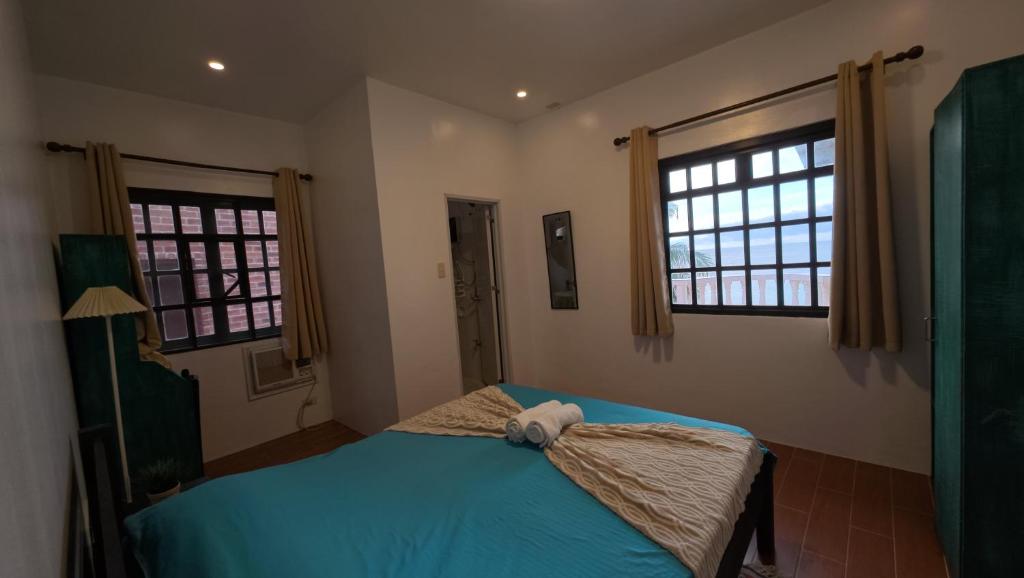 Letto o letti in una camera di FreeDive Inn