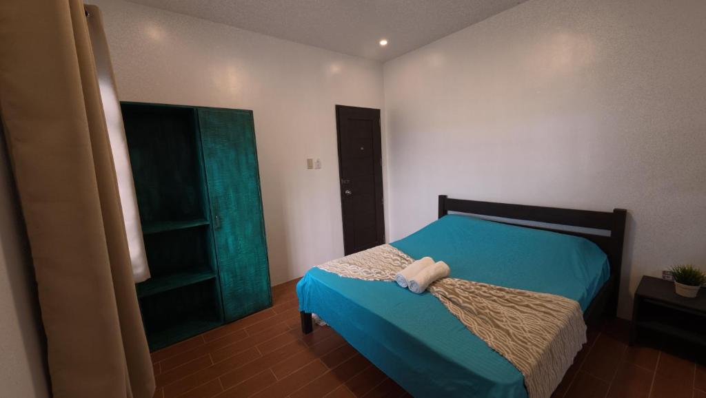 Letto o letti in una camera di FreeDive Inn
