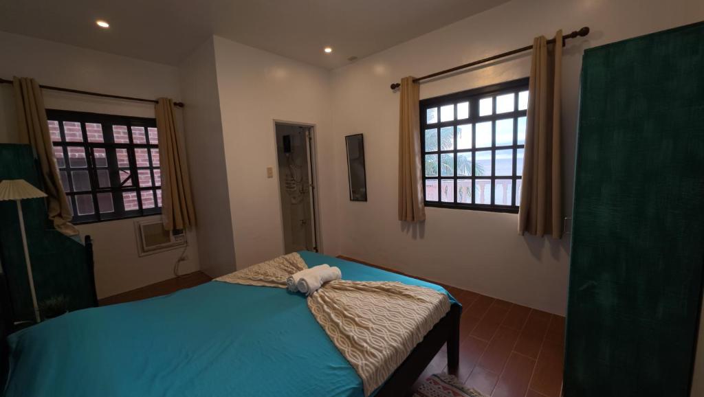 Letto o letti in una camera di FreeDive Inn