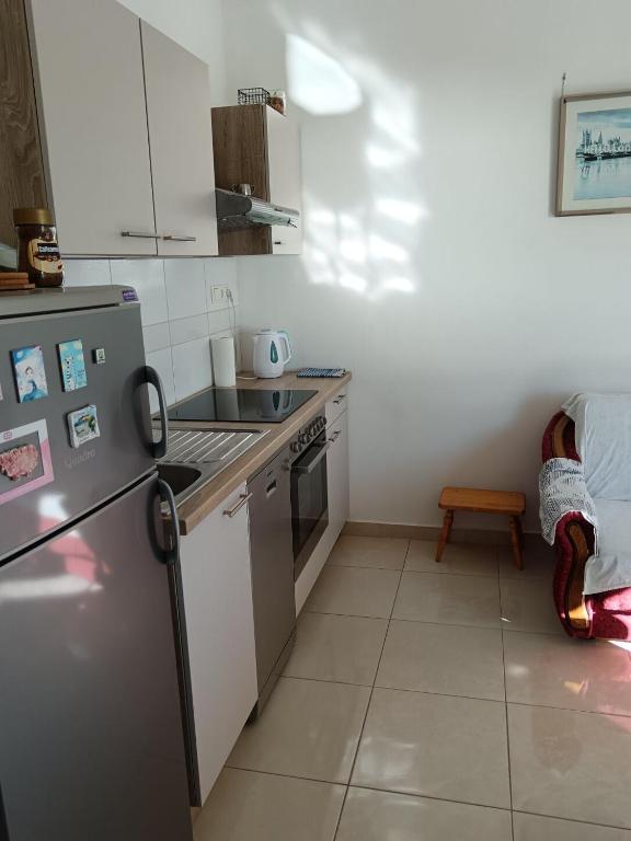 Kuchyňa alebo kuchynka v ubytovaní Apartments Markas
