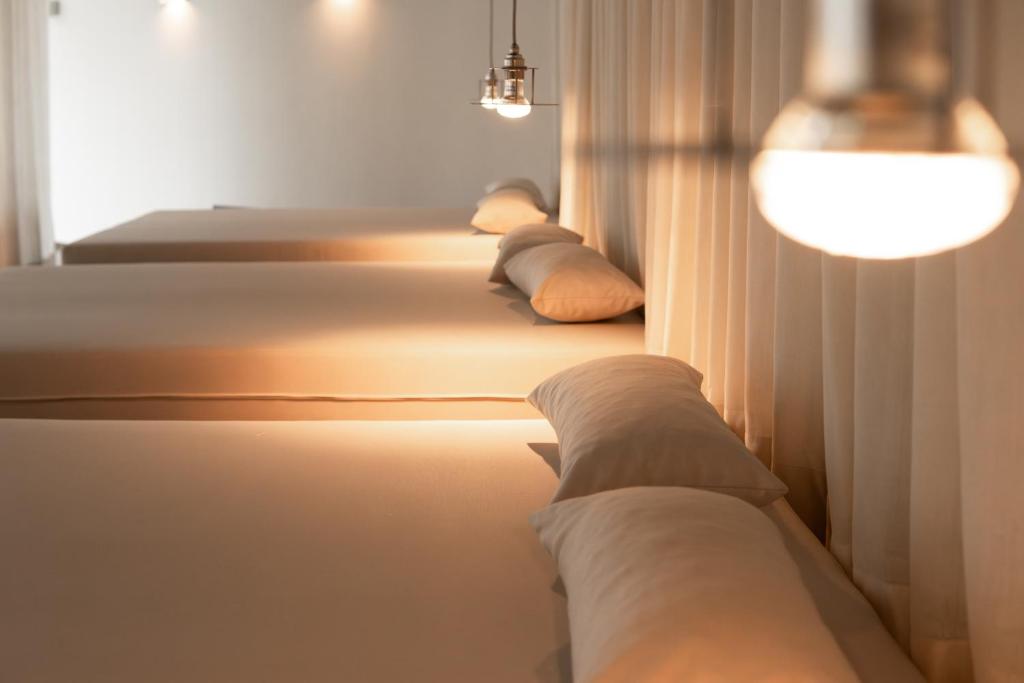 Postel nebo postele na pokoji v ubytování ElzLand Hotel Pfauen WELLNESS & SPA