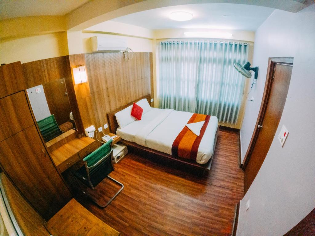 Postel nebo postele na pokoji v ubytování Great Doors Thamel