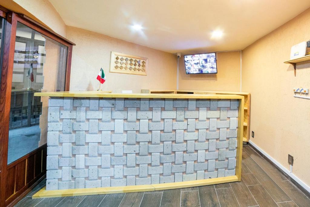 TV a/nebo společenská místnost v ubytování Collection O Casona De Minas