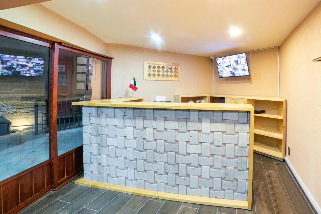 TV a/nebo společenská místnost v ubytování Collection O Casona De Minas