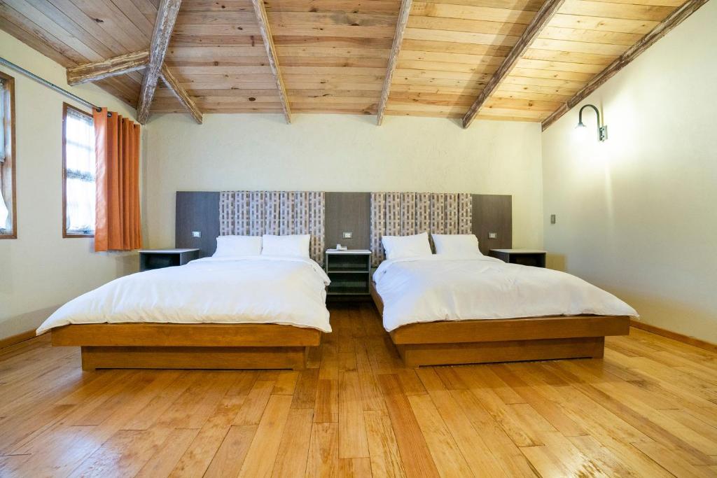 Postel nebo postele na pokoji v ubytování Collection O Casona De Minas