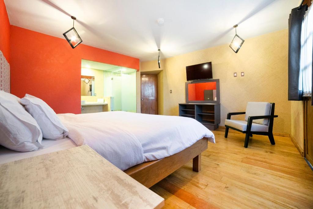 TV a/nebo společenská místnost v ubytování Collection O Casona De Minas