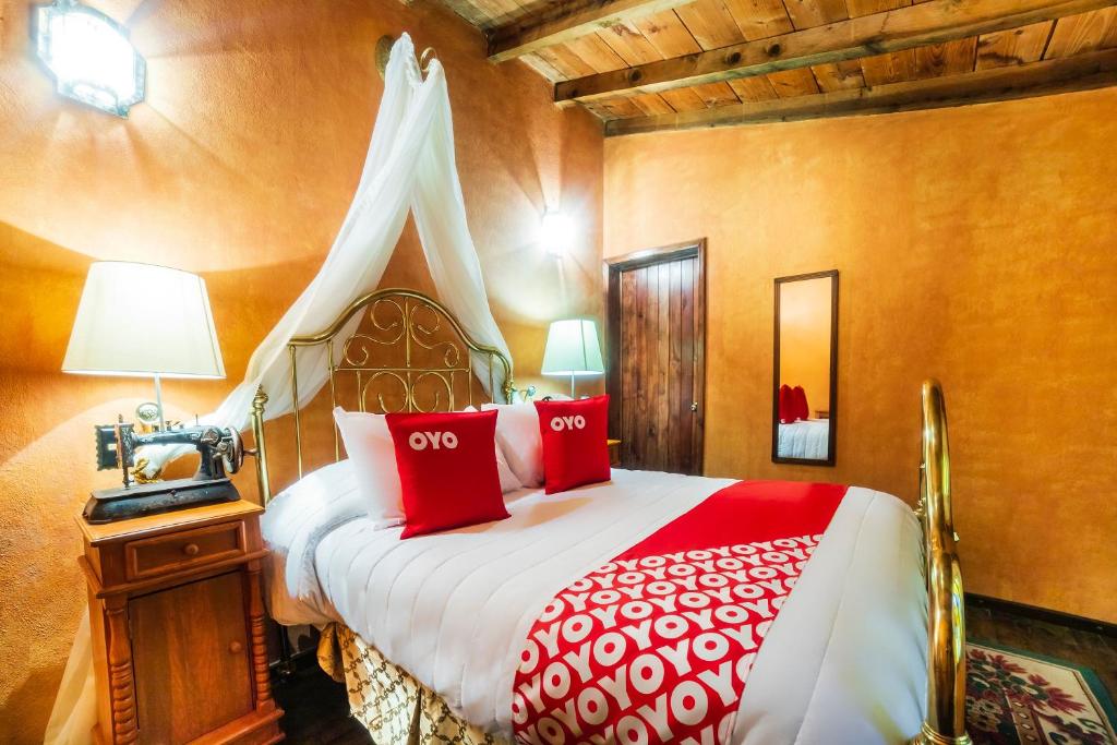 Postel nebo postele na pokoji v ubytování OYO Hotel El Mineral, Tlalpujahua