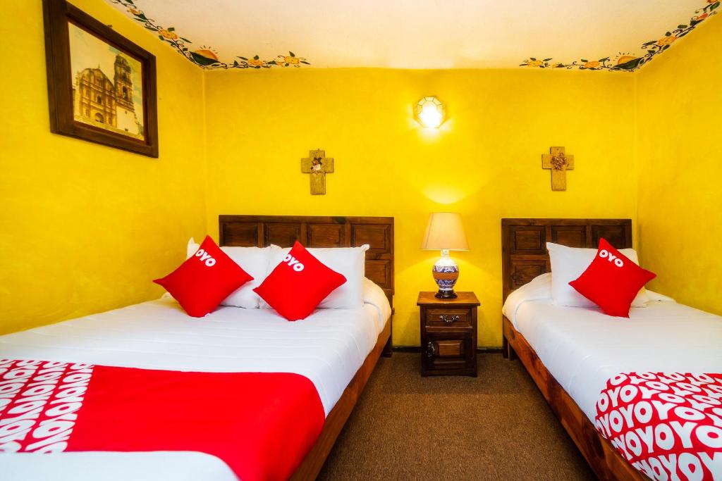 Postel nebo postele na pokoji v ubytování OYO Hotel El Mineral, Tlalpujahua