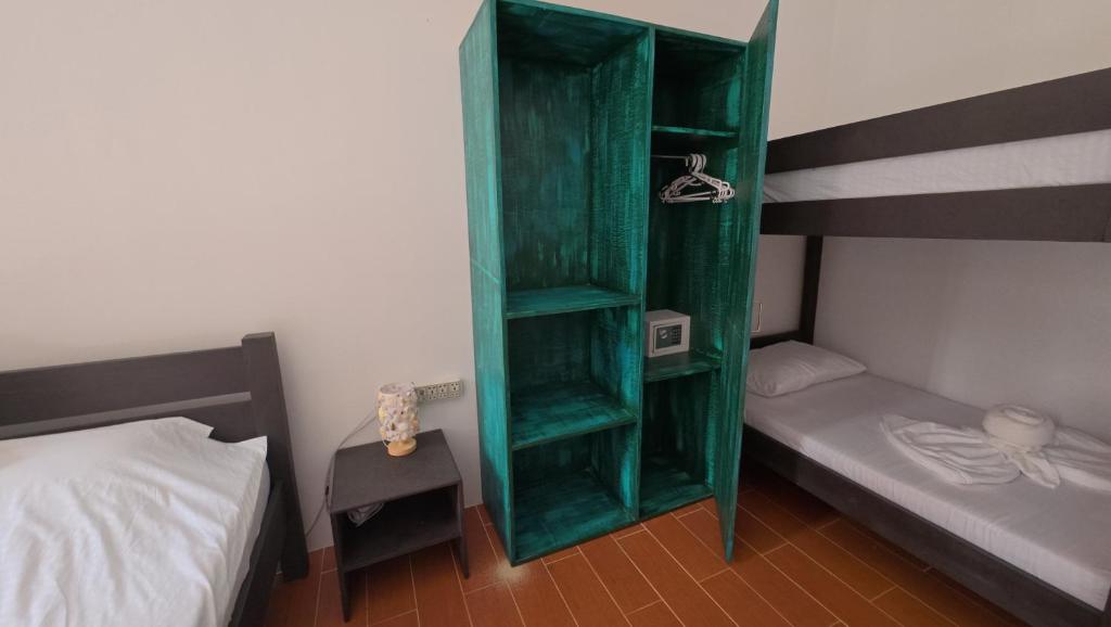 Letto o letti in una camera di FreeDive Inn