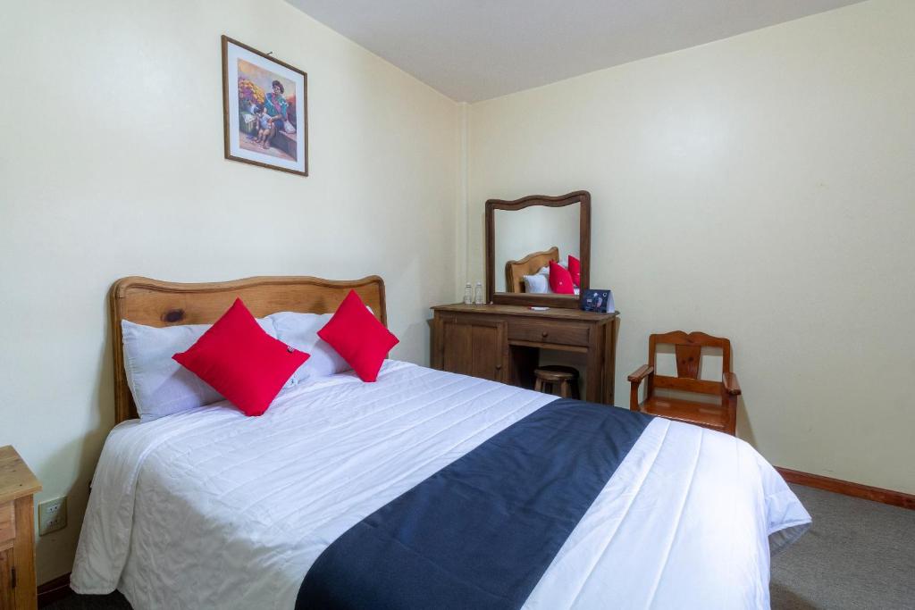 Postel nebo postele na pokoji v ubytování Capital O Hospedaje Los Angeles San Cristobal De Las Casas