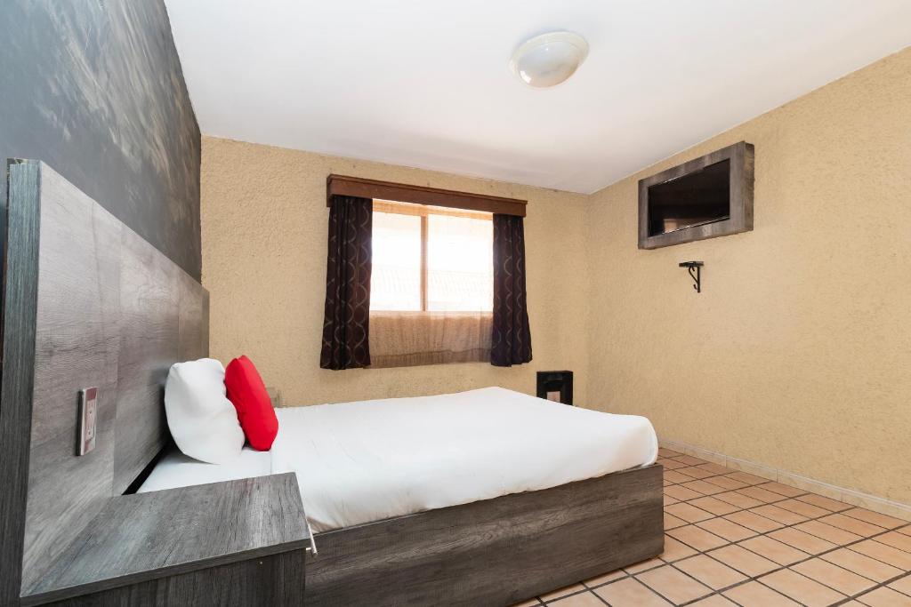 TV a/nebo společenská místnost v ubytování OYO Hotel Real Del Sur, Estadio Chihuahua