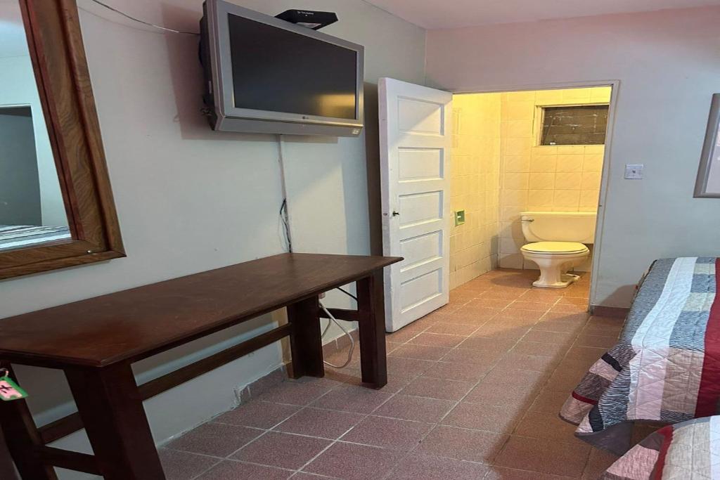 Postel nebo postele na pokoji v ubytování OYO Hotel Linda