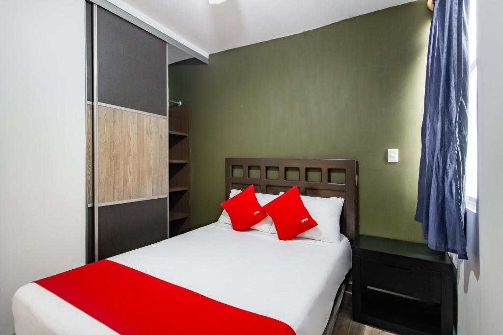 Postel nebo postele na pokoji v ubytování OYO Hotel Halley