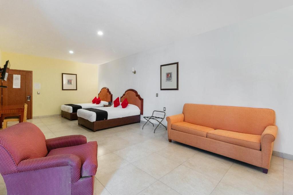 Posezení v ubytování Capital O Hotel Vitalé