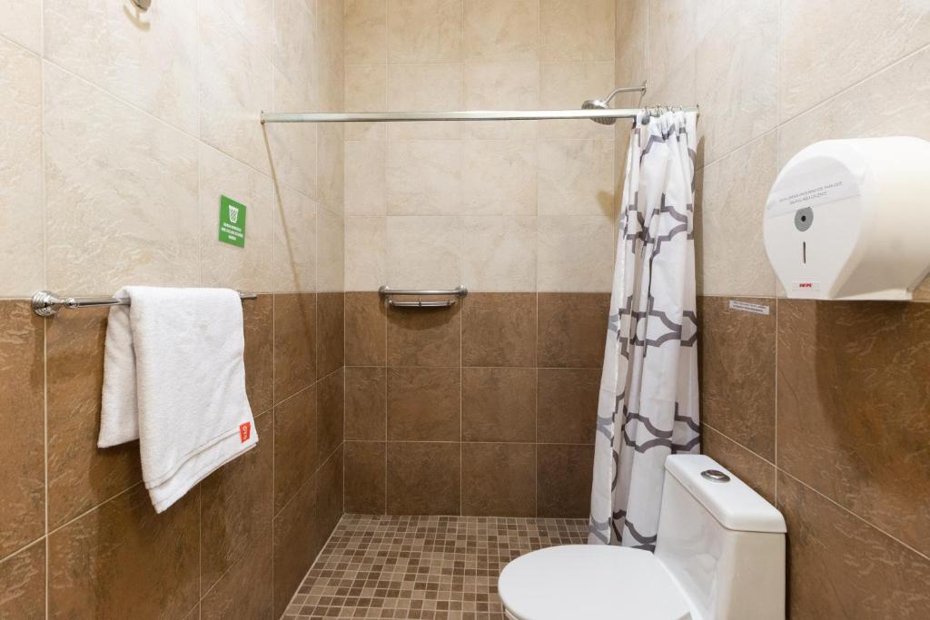 Koupelna v ubytování Capital O Hotel Vitalé