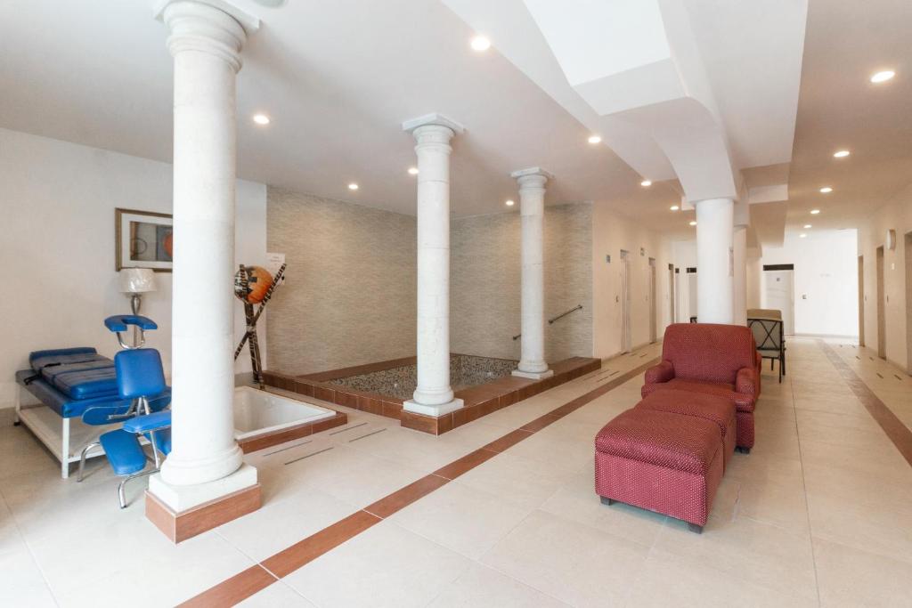Posezení v ubytování Capital O Hotel Vitalé