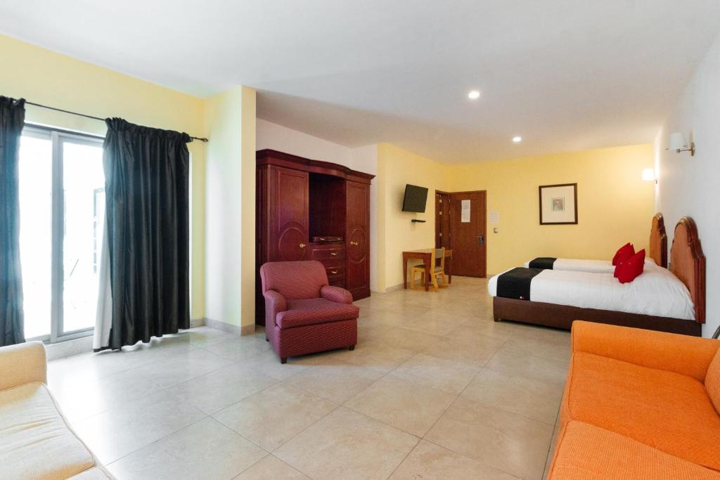 Posezení v ubytování Capital O Hotel Vitalé
