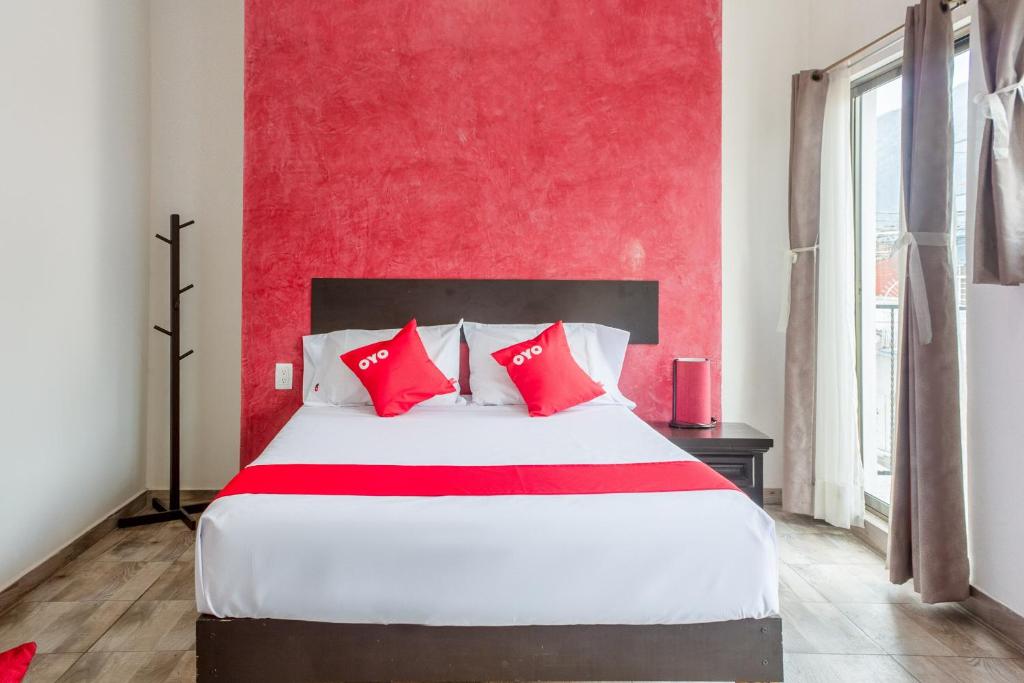 Postel nebo postele na pokoji v ubytování OYO Hotel Gandag