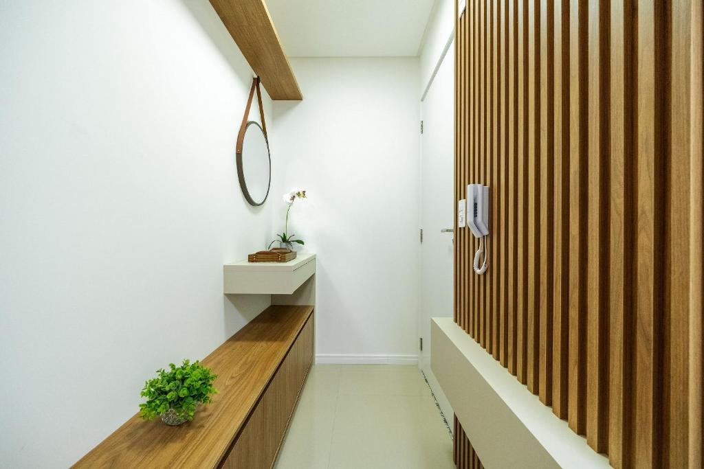 Et badeværelse på Achei Itapema • 3 Quartos + Piscina e vista linda