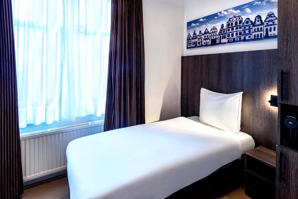 Postel nebo postele na pokoji v ubytování Hotel Nes Amsterdam