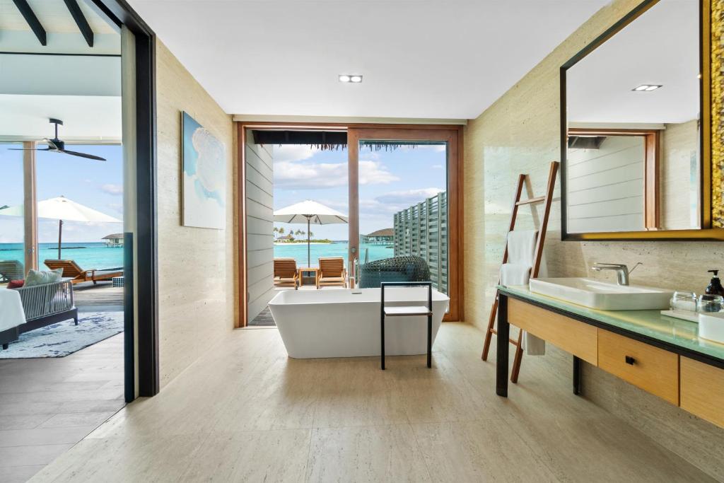Radisson Blu Resort Maldives with 50 percent off on Sea Plane round trip 03 nights & above photo