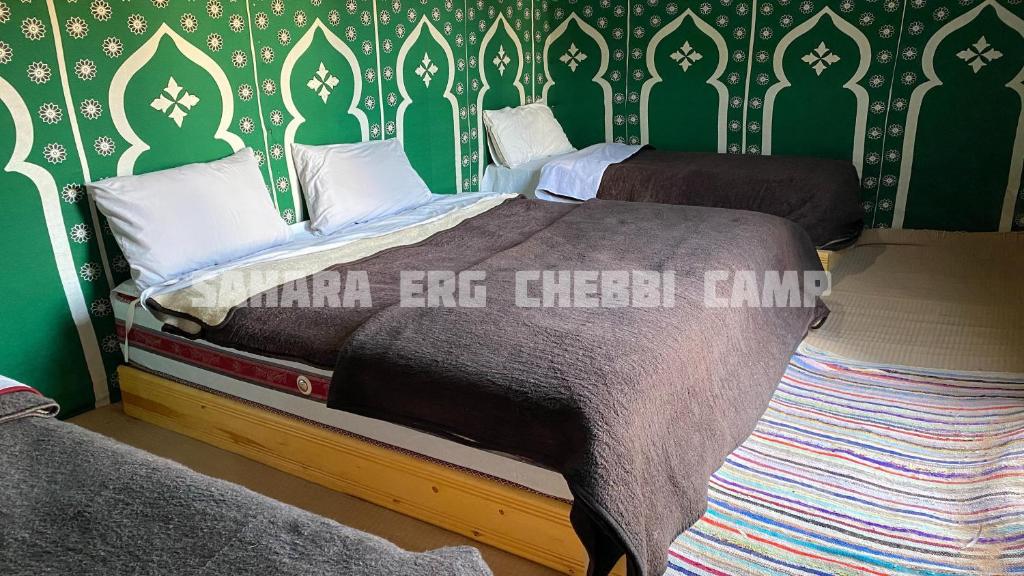 Postel nebo postele na pokoji v ubytování Sahara Erg Chebbi Camp