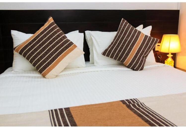 Postel nebo postele na pokoji v ubytování Motel VIP